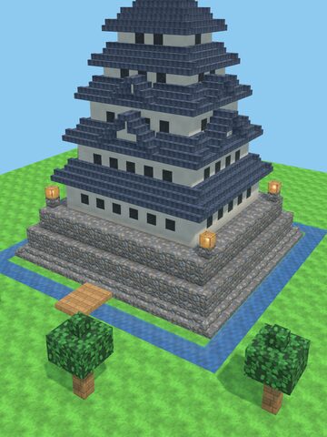 石垣の上に黒い瓦の天守が立つ、姫路城のようなお城