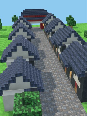 石畳の道の両側に瓦屋根の町家が並ぶ通り